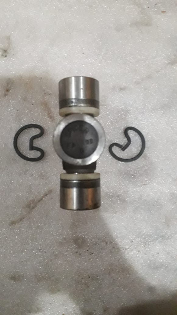 CarTrends Tavera propeller shaft journal spare part, showing the metal shaft component with detailed machining and wear marks.