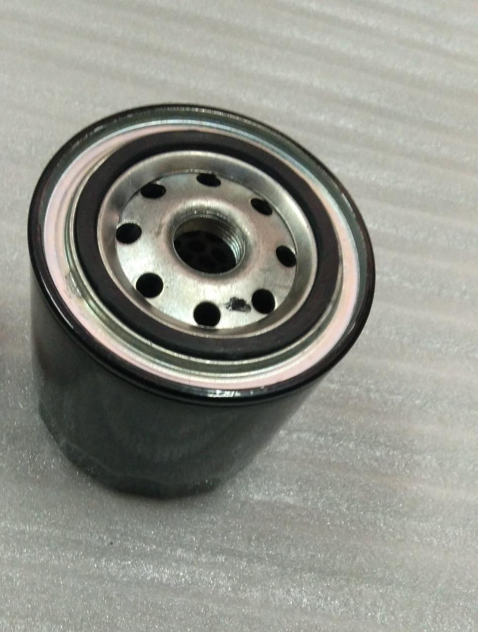 CarTrends oil filter assembly for Tavera, spare parts image showing the replacement oil filter unit for vehicle maintenance.