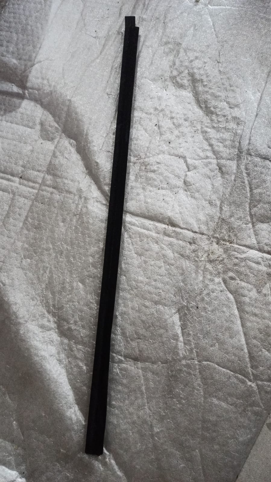 CarTrends rear right side door seal for Tavera, spare auto part, showing close-up of the rubber seal on the vehicle door