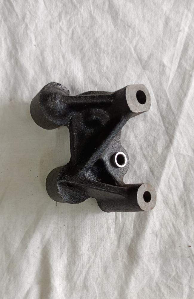 CarTrends T94478880 Power Assembly Bracket for Tavera, automotive spare part with metal mounting points and durable construction.