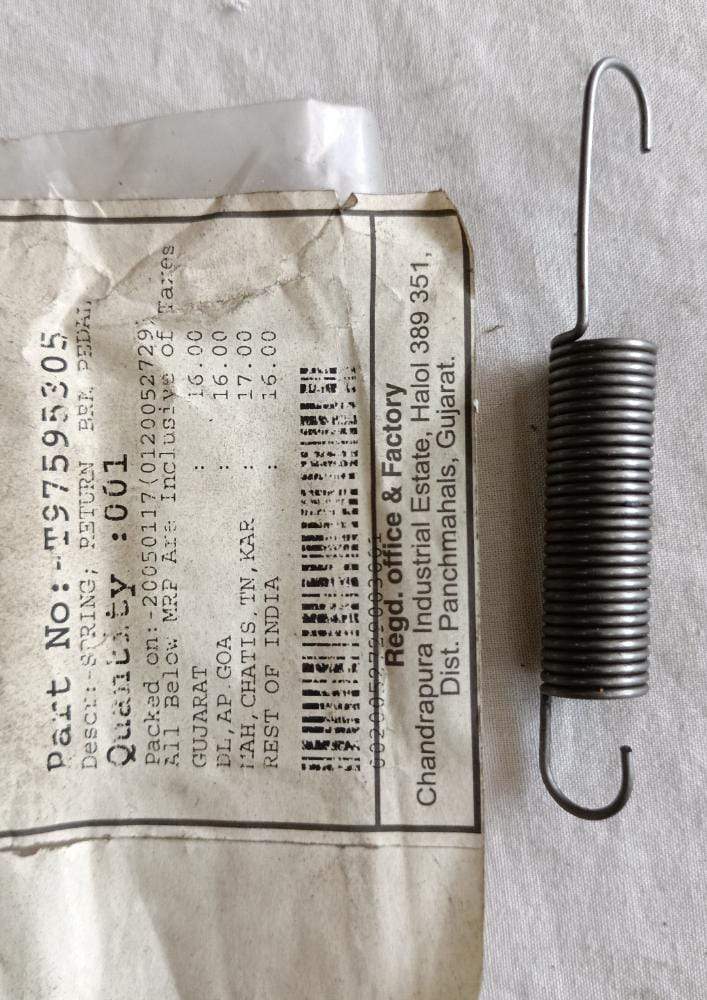 CarTrends brake pedal return spring for Tavera, close-up of the spare part showing its coiled metal structure.