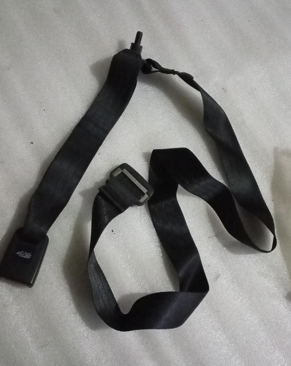 CarTrends T97595677 seat belt lap cover for Tavera, a spare part designed to protect and cover the seat belt area.