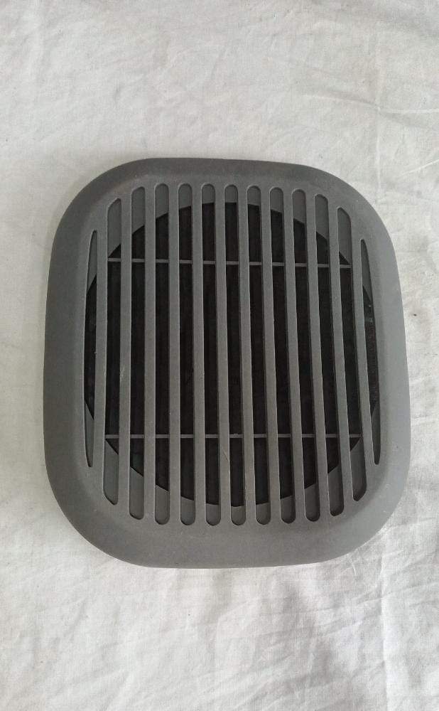 Beige CarTrends rear speaker grille for Tavera, spare car part with a beige finish, designed to fit Tavera vehicles.