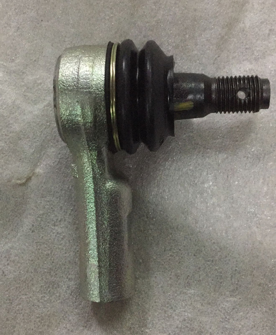 CarTrends T97596275 Tie Rod End for Tavera, close-up of the automotive spare part showing connection points and metal components.