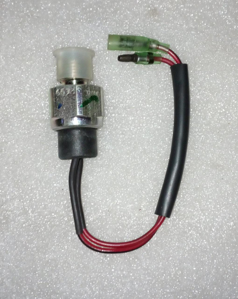 CarTrends reverse lamp switch for Tavera, a spare part with a black plastic toggle and wiring connection for vehicle reverse lights.