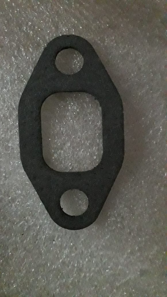CarTrends EGR valve gasket for Tavera, close-up of the spare part showing the gasket's shape and material details.