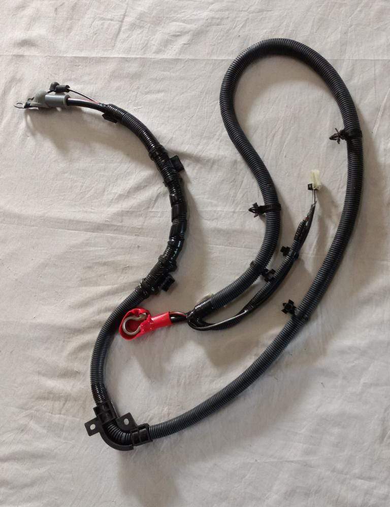 CarTrends T97690336 Starter Cable Battery for Tavera, automotive spare part with wiring and connectors visible.