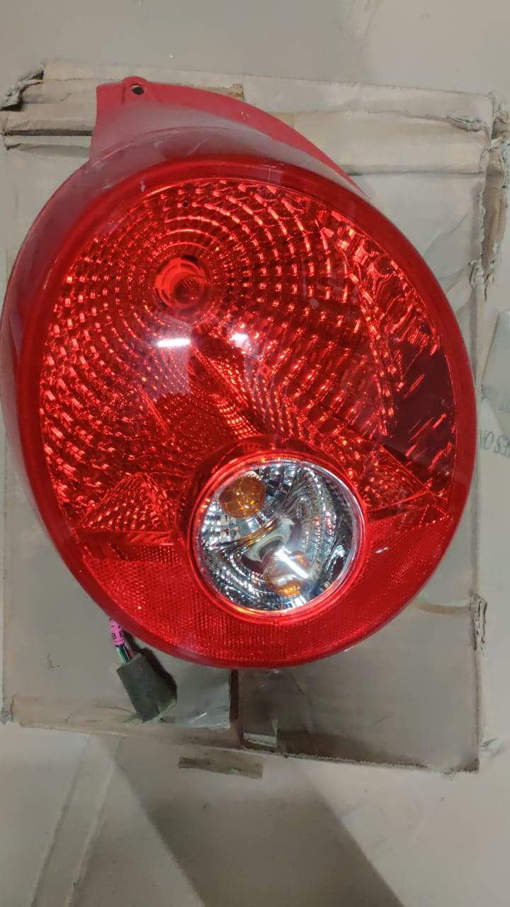 CarTrends left tail lamp spark for J42403114, a spare automotive part with clear lens and mounting features.