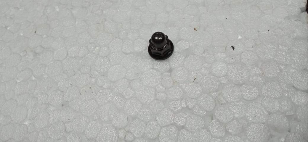 CarTrends Tapet Cover Nut for Aveo, spare part shown in black plastic with metal threading, designed for car maintenance.