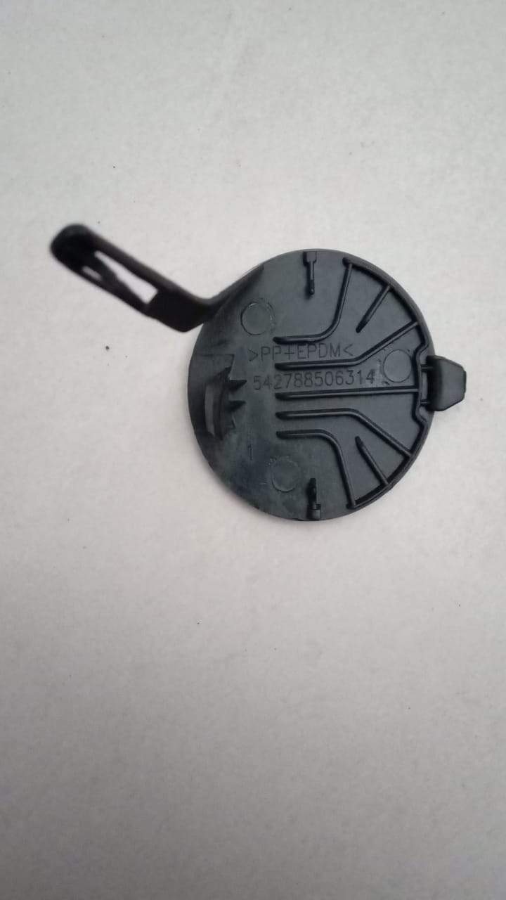 CarTrends Tata Zest front bumper tow hook cover bolt, spare part hardware for bumper repair, close-up view.