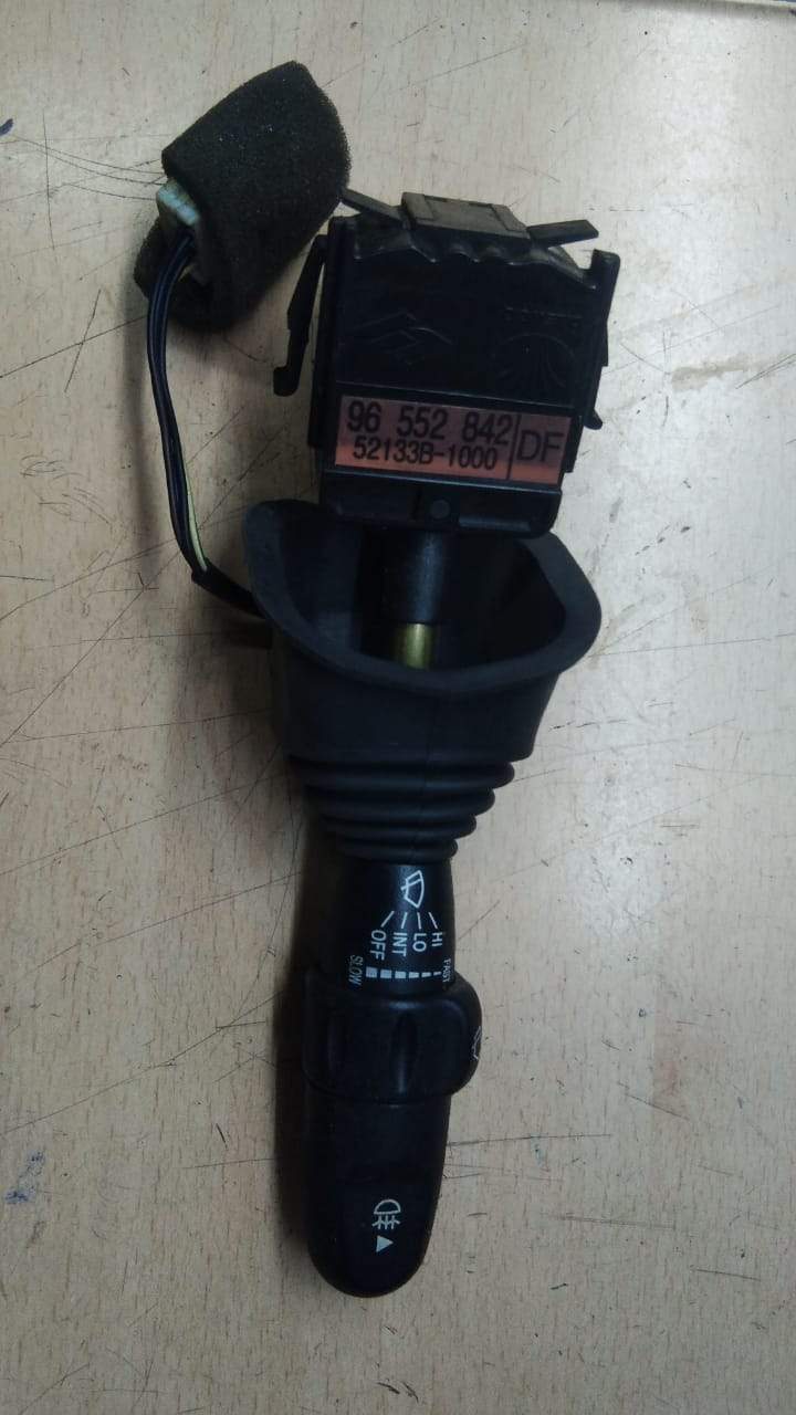 CarTrends wiper switch assembly with rear fog lamp for Chevrolet Optra, showing the spare part and switch components.