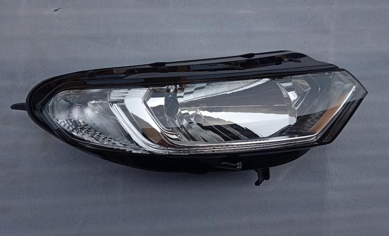 Ford headlamp for LH side, model CN1Z13100A, standard automotive headlight for Ford vehicles.