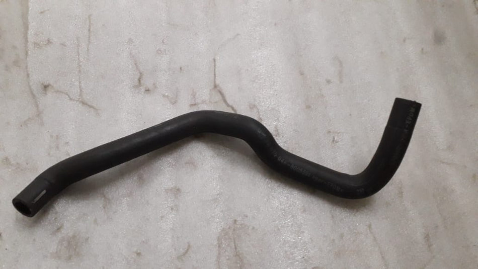 General Motors Astra hose header tank to connection tube for engine, showing the black plastic component with attached hoses.