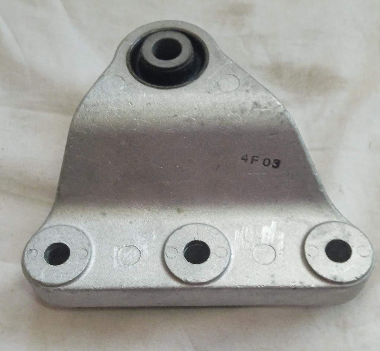 Rear transmission mount bracket assembly for Chevrolet Beat by General Motors, showing the metal bracket and mounting points.