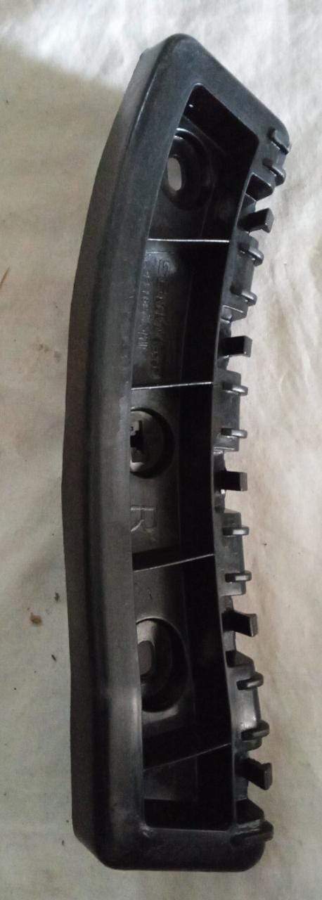 Rear upper bumper fascia bracket for Chevrolet Enjoy by General Motors, shown in a close-up of the vehicle's rear area.