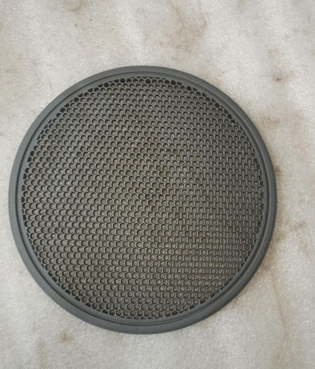 Rear speaker grille for Chevrolet Aveo, compatible with J96408076, made by General Motors, shown in black with a textured finish.