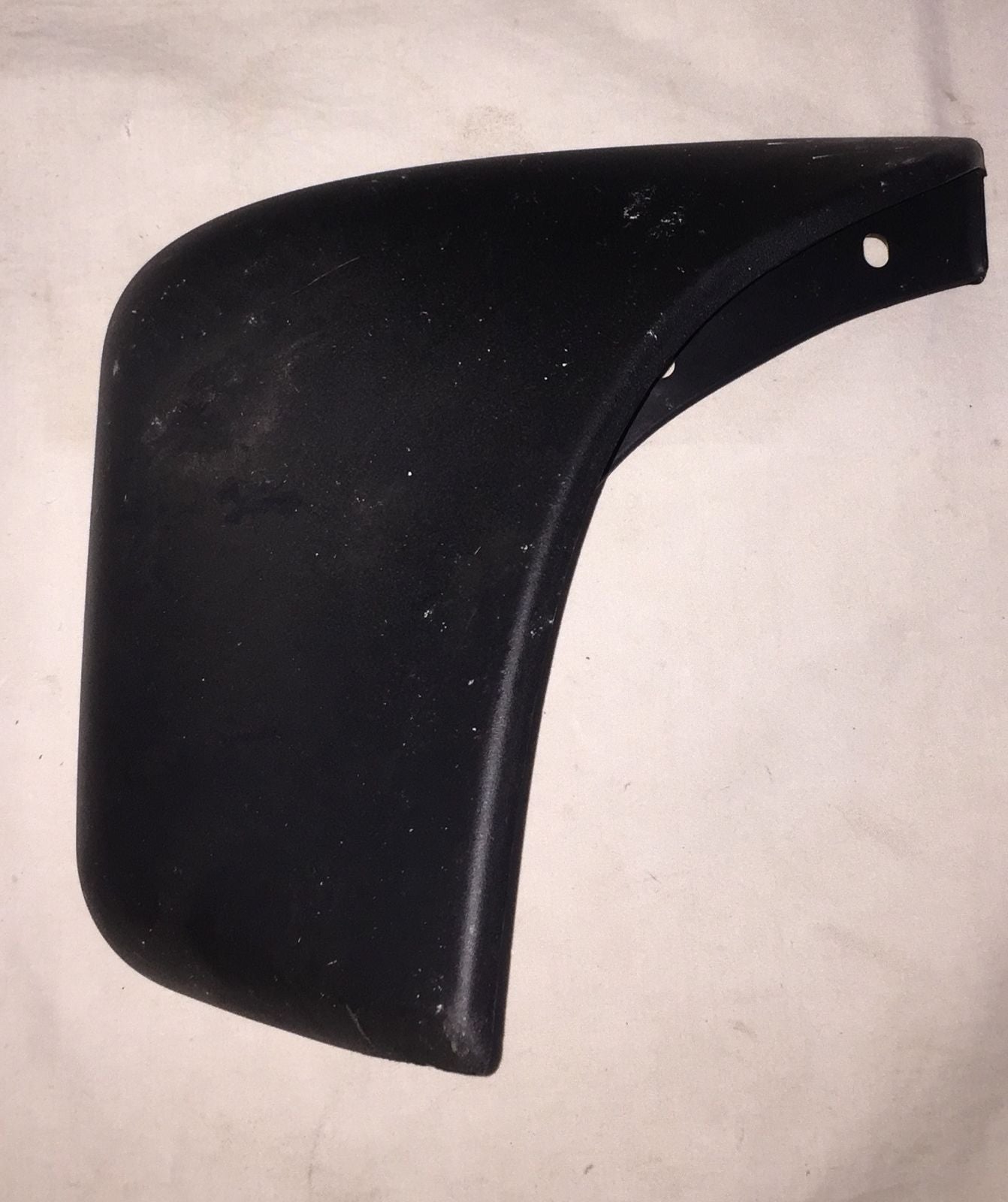 General Motors Guard A Mud right rear side for Spark J96590747, visible on vehicle wheel arch and mudguard area.