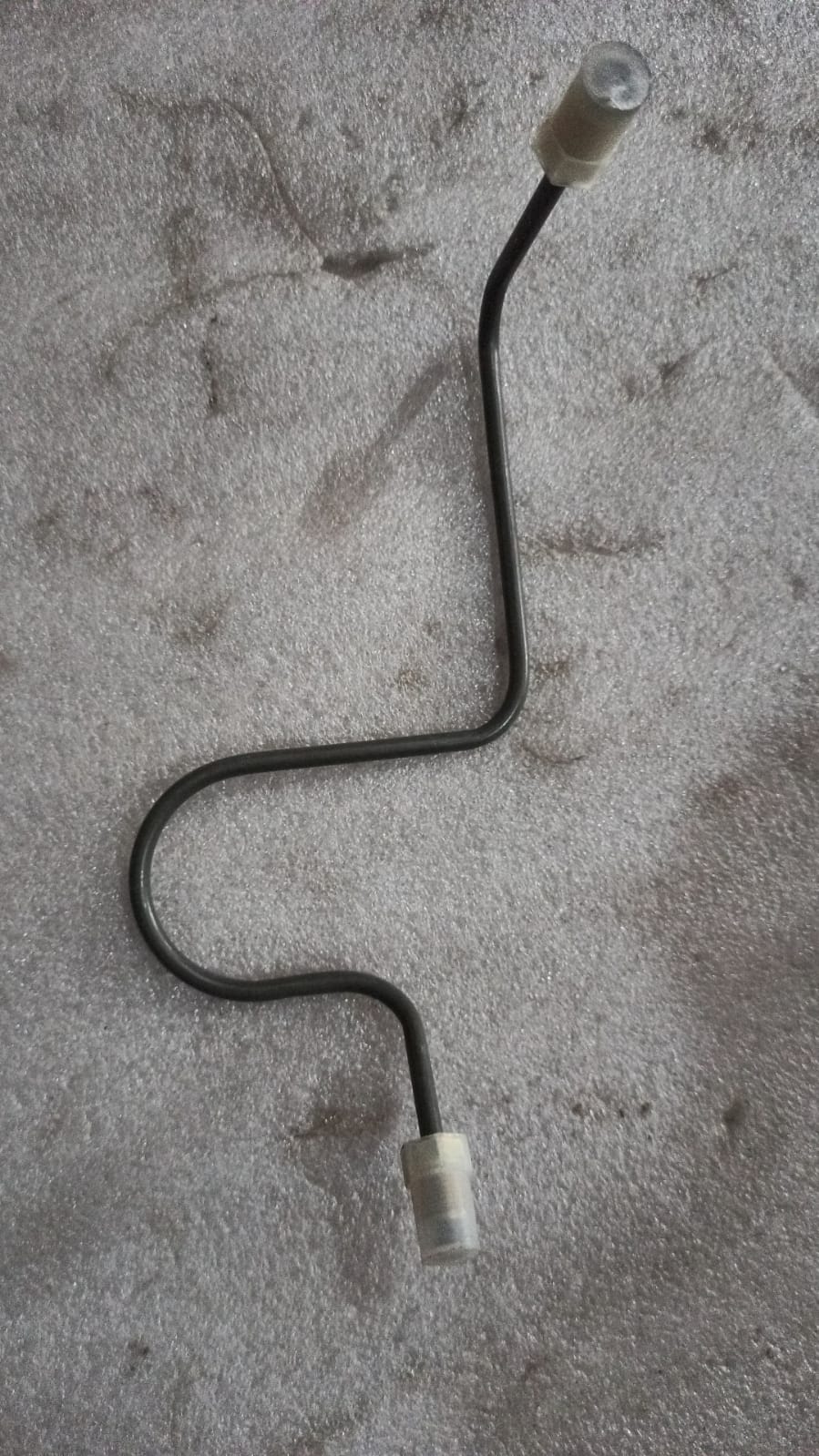 General Motors Tavera IPE ASM 0Rake M C 3Way engine part in black with visible connectors and metal components.