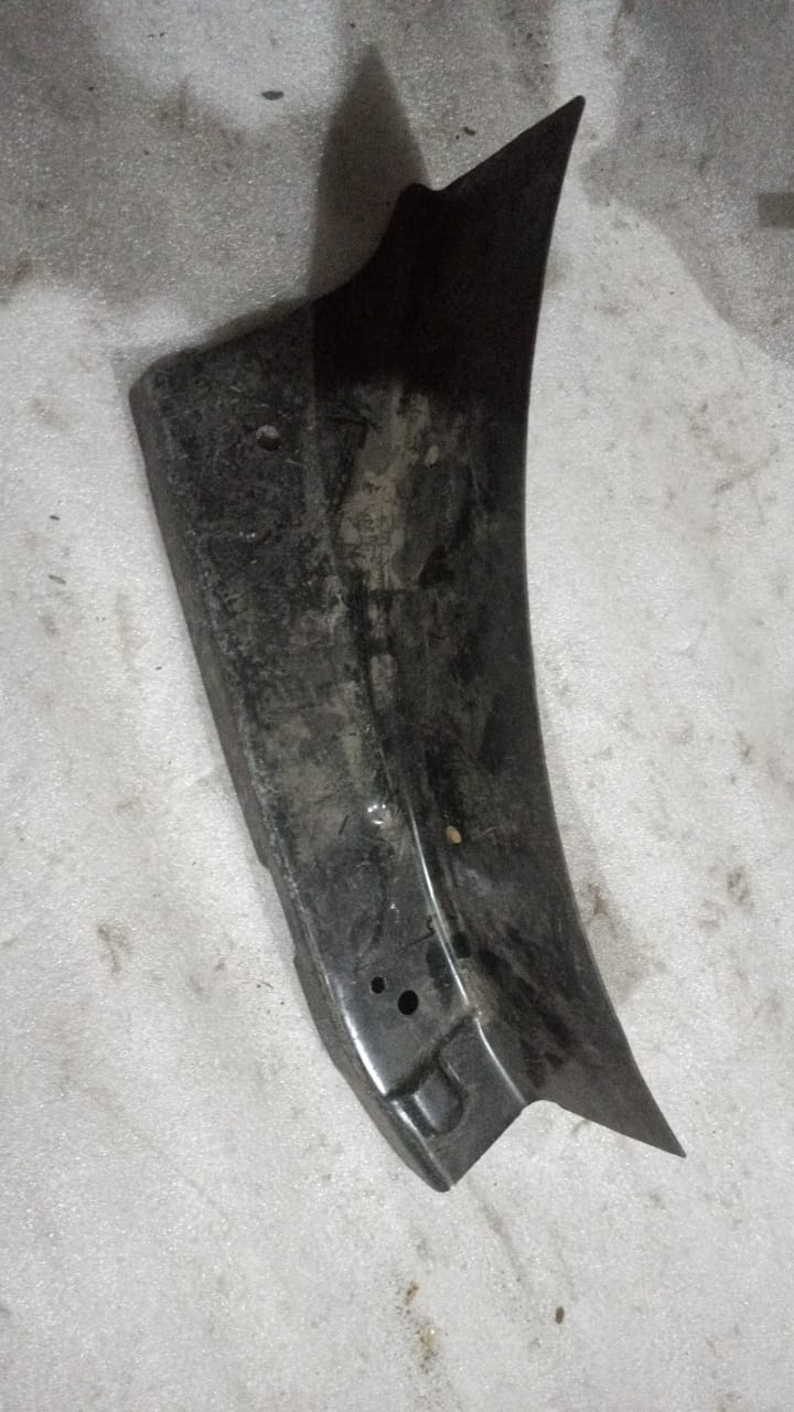 Rear left wheel housing panel brace for Chevrolet Cruze by General Motors, showing the metal support part in the image.