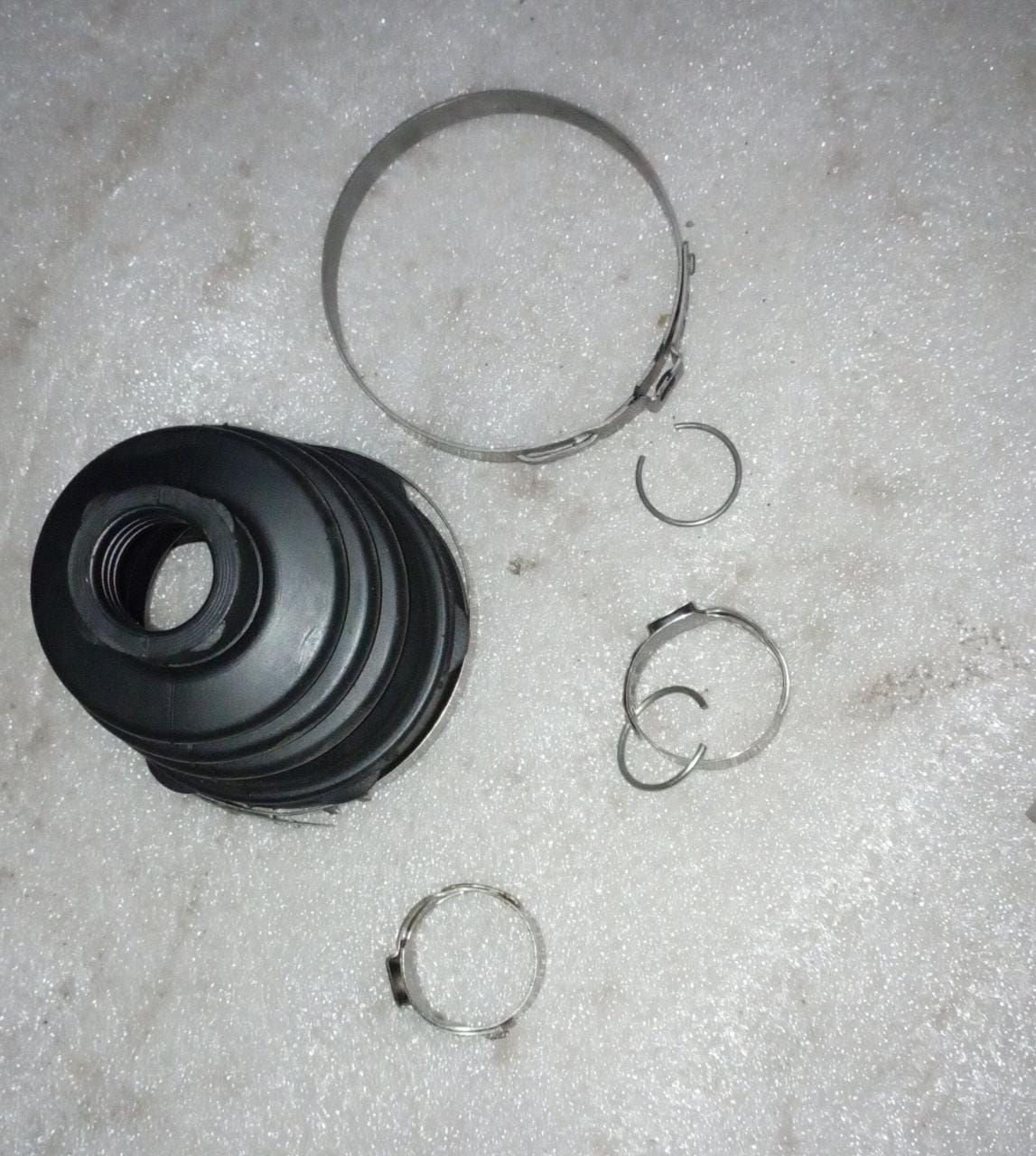 Front wheel drive shaft seal kit for Chevrolet Spark, compatible with GM's J28297176 tri-pot joint, front wheel drive application.