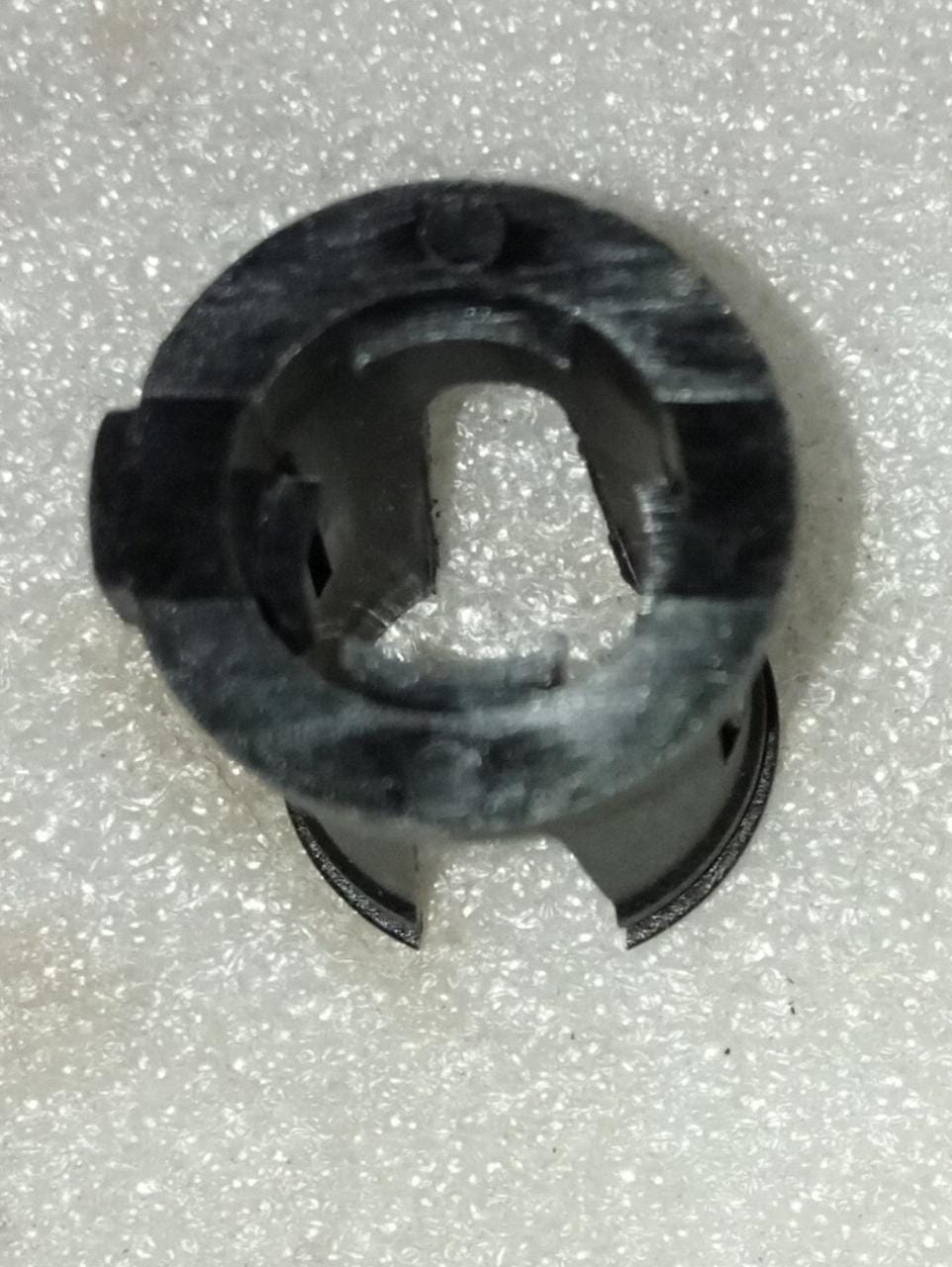General Motors manual transmission bush for Optra vehicle, close-up view of the black rubber component.