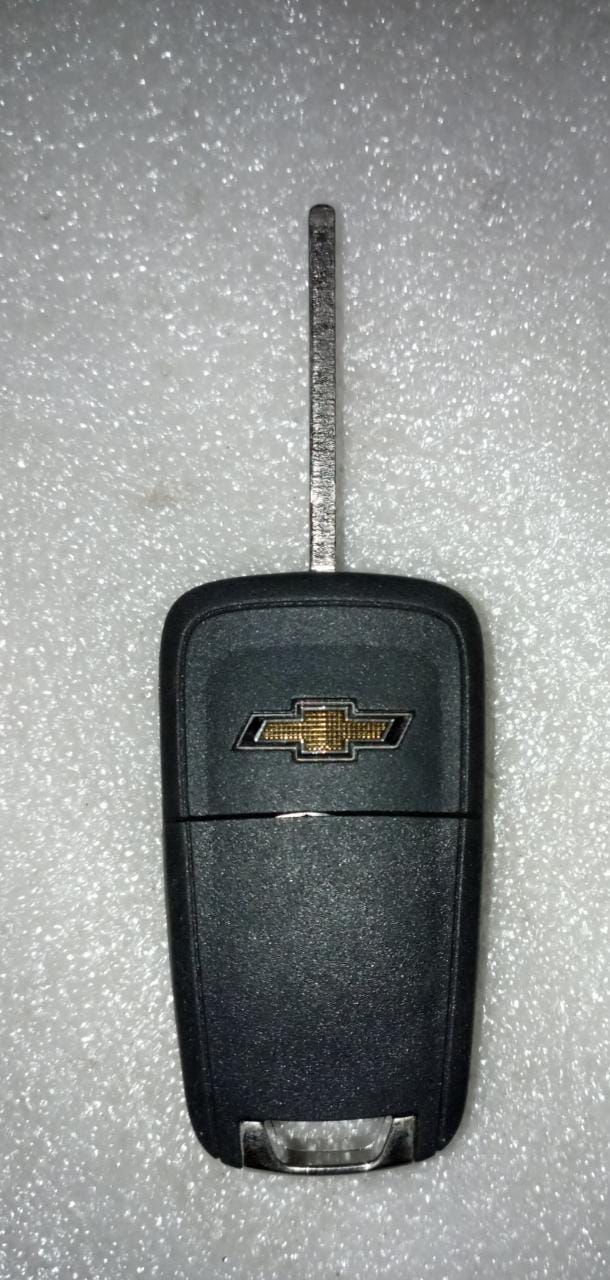 General Motors key fob ignition switch for Chevrolet Cruze J13504195, showing the key slot and ignition button.