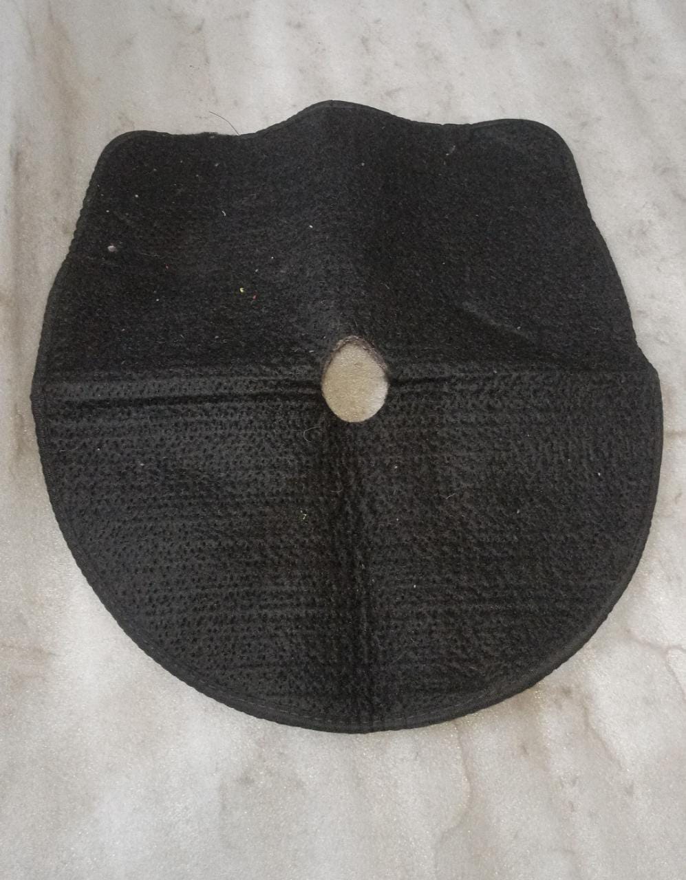 General Motors spare tire spark pad J28291094, automotive part designed for vehicle maintenance and tire safety.