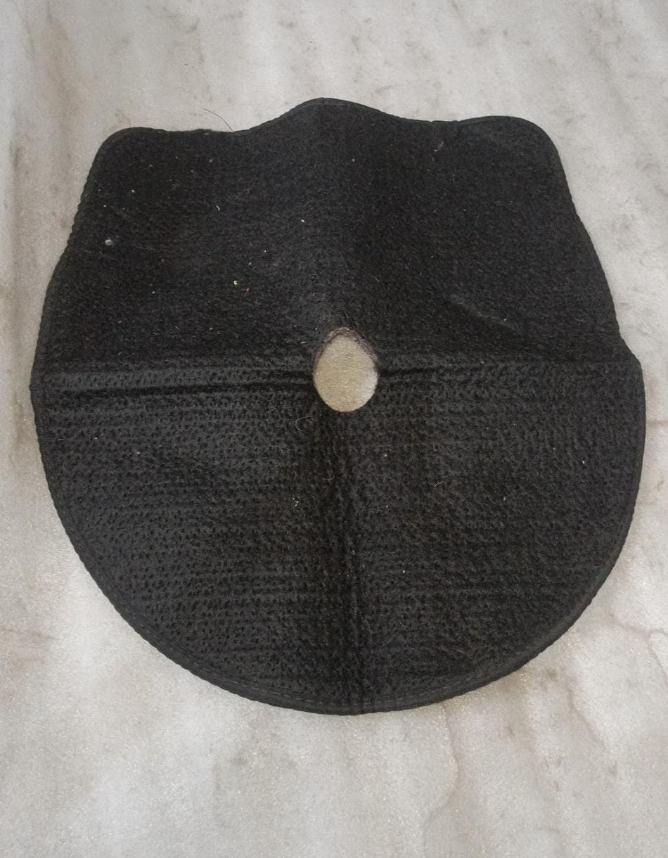 Spare tire pad for Chevrolet Spark, manufactured by General Motors, showing the black rubber pad with GM branding.