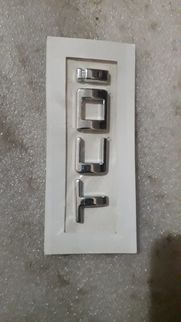 General Motors vehicle gate latch plate assembly with part number J90905094, showing the metal component and mounting points.