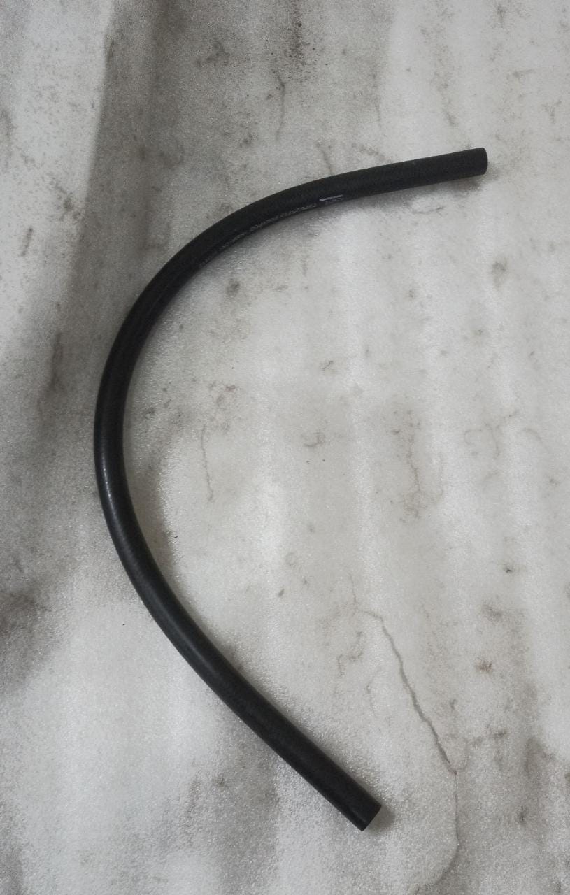 Rubber fuel filter hose for Tavera vehicle, compatible with General Motors models, shown in a close-up view.