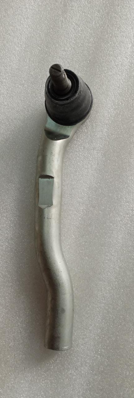 Honda BRV left side tie rod end, OEM part 53560TF0003, showing the metal linkage component with rubber boot.