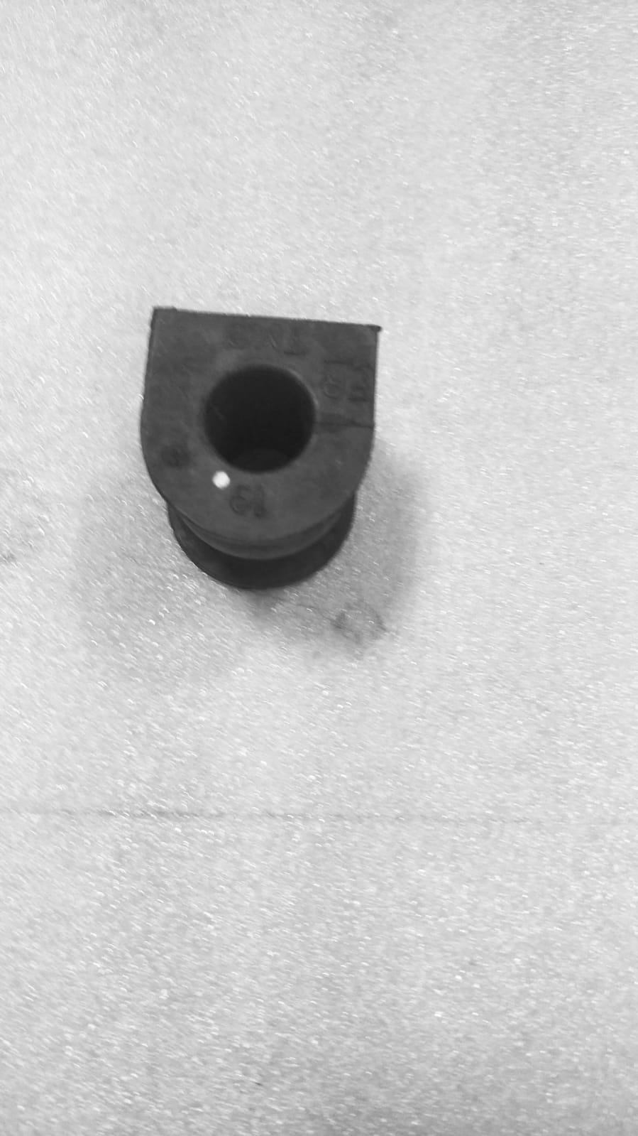 Honda Bush Stabilizer Holder Front right for Honda models, part number 51306TM0003, shown in the image.