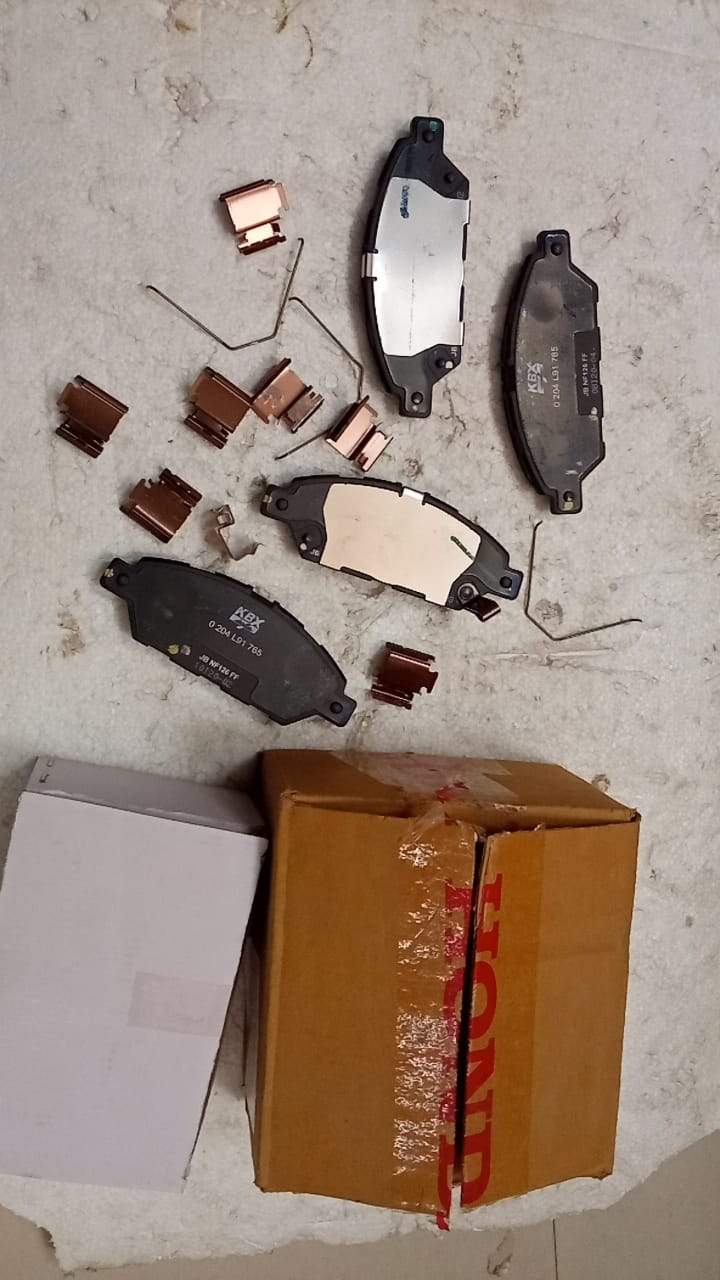 Honda Amaze front brake pad, model 45022TSVK01, shown in a close-up image for 2018 onward vehicle maintenance.