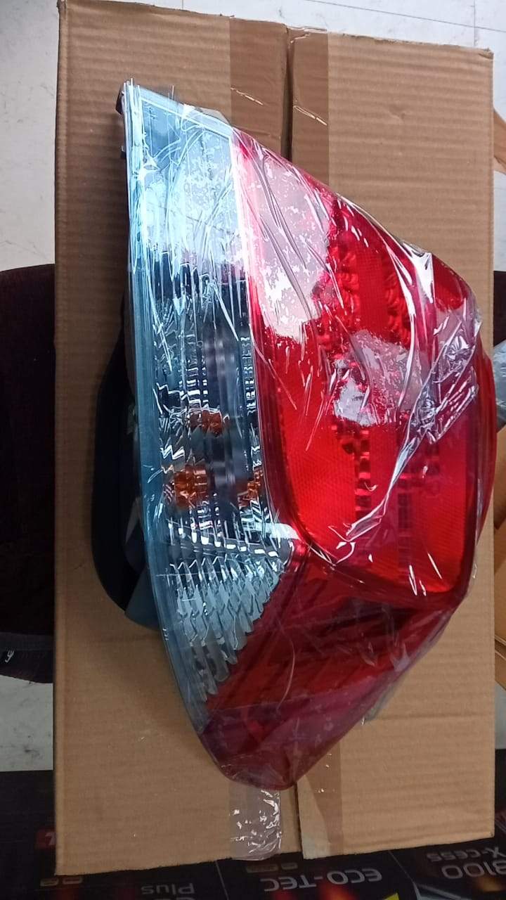 Right tail light for Honda Amaze, model 33500T4TT01, showing the red lens and mounting points for rear vehicle illumination.