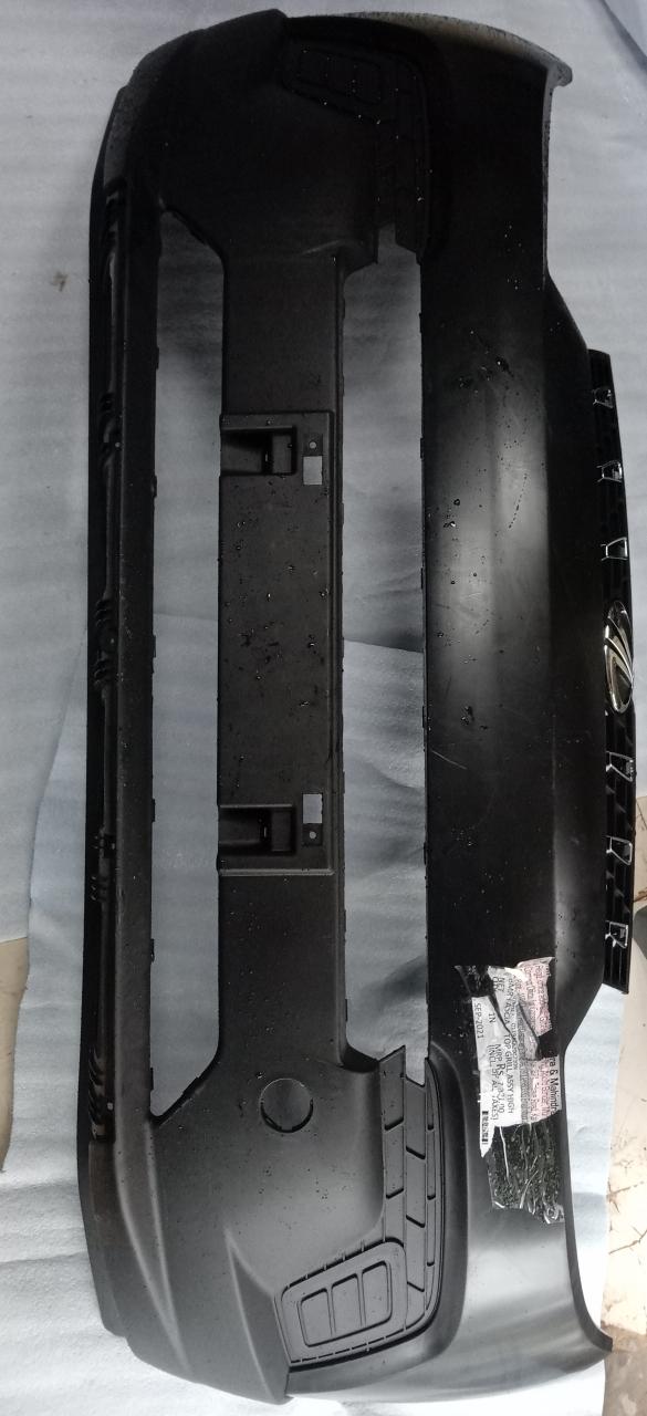 Mahindra KUV 100 front bumper part, black plastic auto replacement for K4 model, in close-up view
