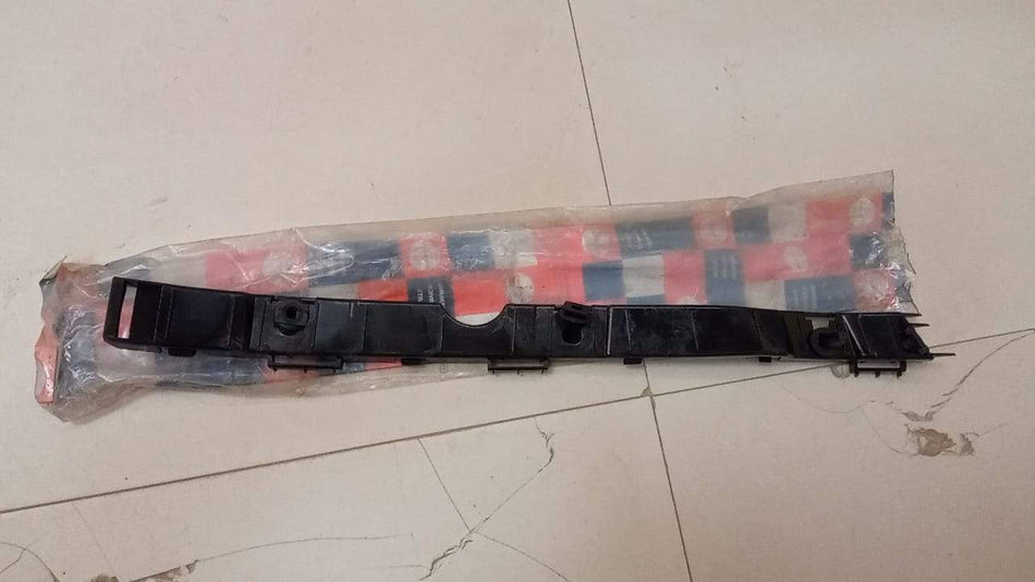 Mahindra XUV 500 right rear bumper bracket, durable automotive part for vehicle repair or replacement.