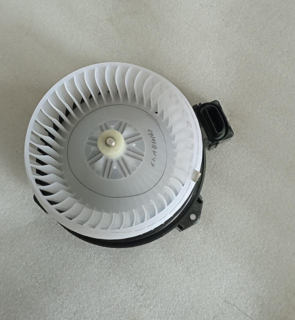 Maruti Suzuki blower motor for Swift, Dzire, and Ritz models showing the automotive blower motor part.