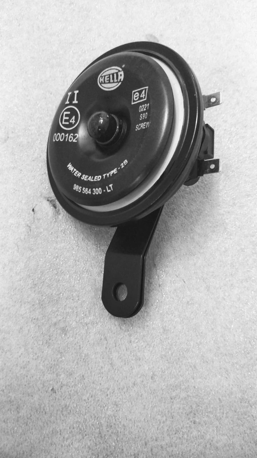 Maruti Suzuki horn assembly with low-pitched design, part number 38500M74L40, showing the automotive horn in close-up.
