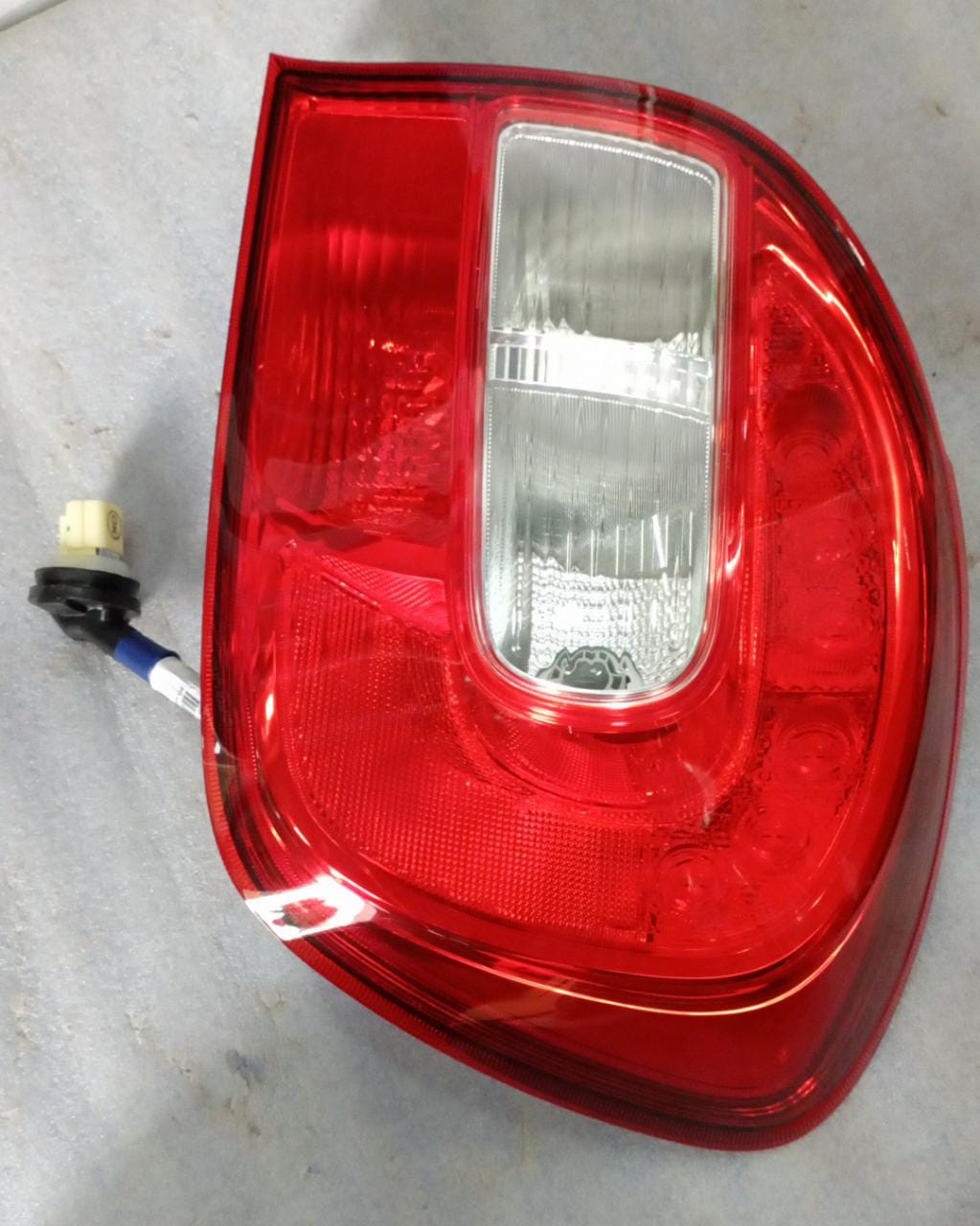 Maruti Suzuki lamp unit RR comb RH 35650M68P01 for vehicle lighting and signaling, shown in a close-up image.