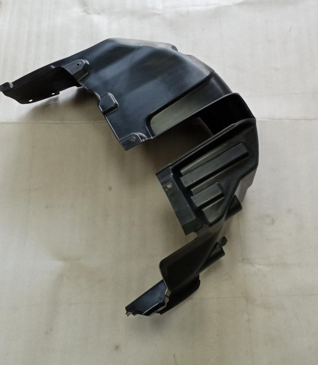 Maruti Suzuki rear fender lining for right-hand side, model RH 75511M74L00, in black automotive plastic.