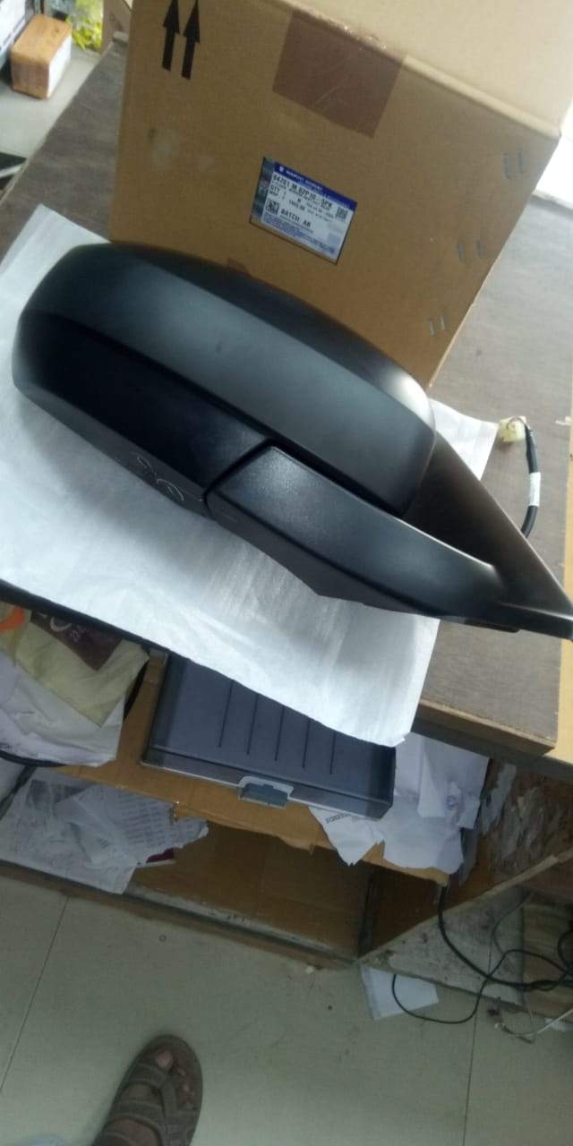Right side mirror for Maruti Suzuki Breeza, model 84701M82P105PK, showing the mirror and mounting bracket.