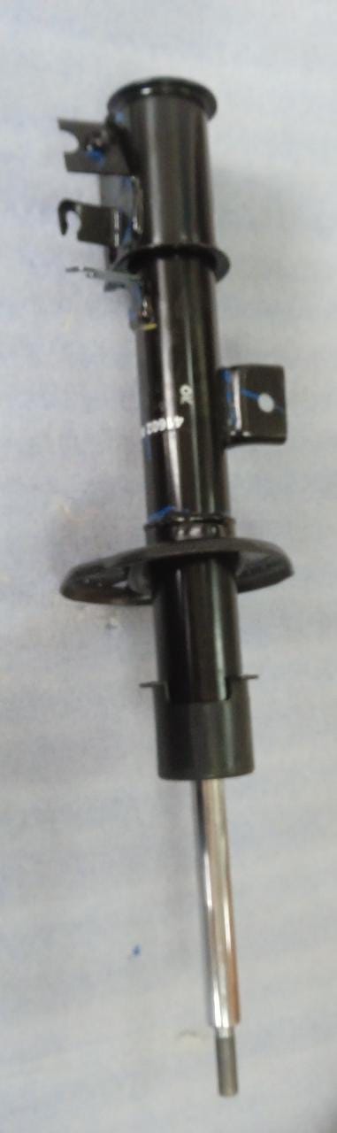 Maruti Suzuki Brezza front left shock absorber with part number 41602M82P50, visible in a detailed automotive image.