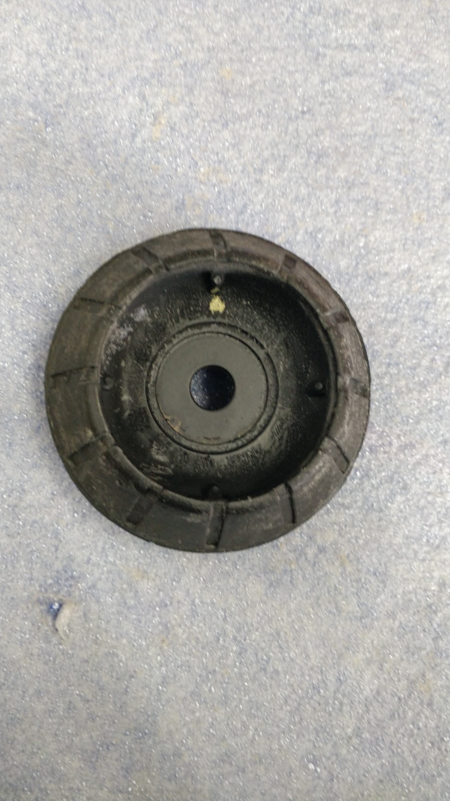 Maruti Suzuki support front strut part 41710M76M00, automotive suspension component with Maruti Suzuki branding and visible mounting points