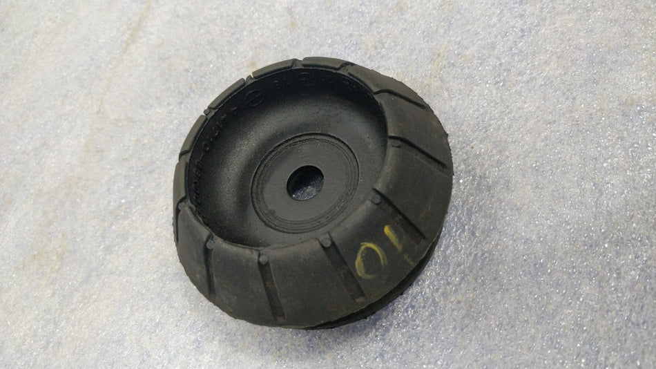 Maruti Suzuki SupportFront Strut 41710M68K00, automotive suspension component, in a close-up view of the part.