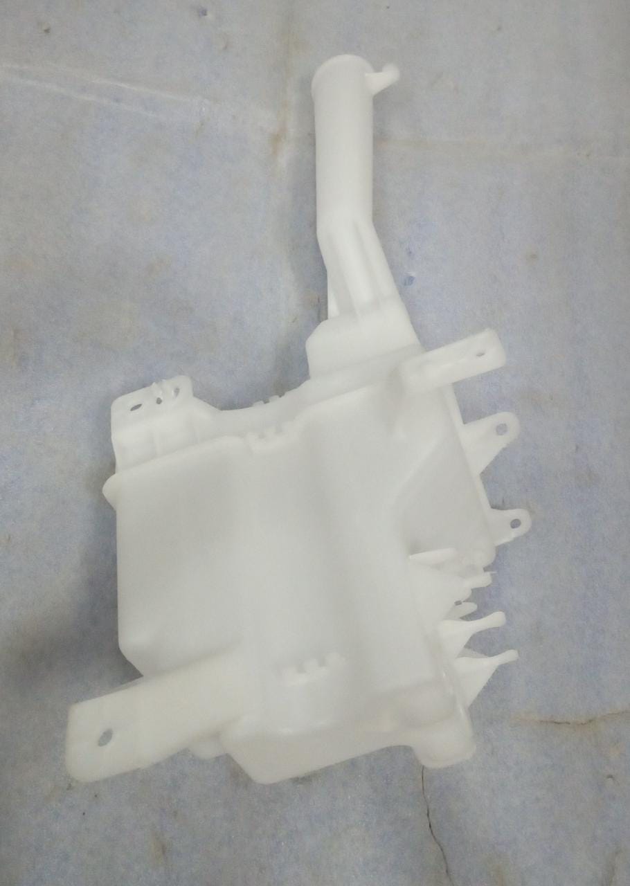 Front washer tank assembly for Maruti Suzuki vehicles, part number 38450M56R30, shown in the image.