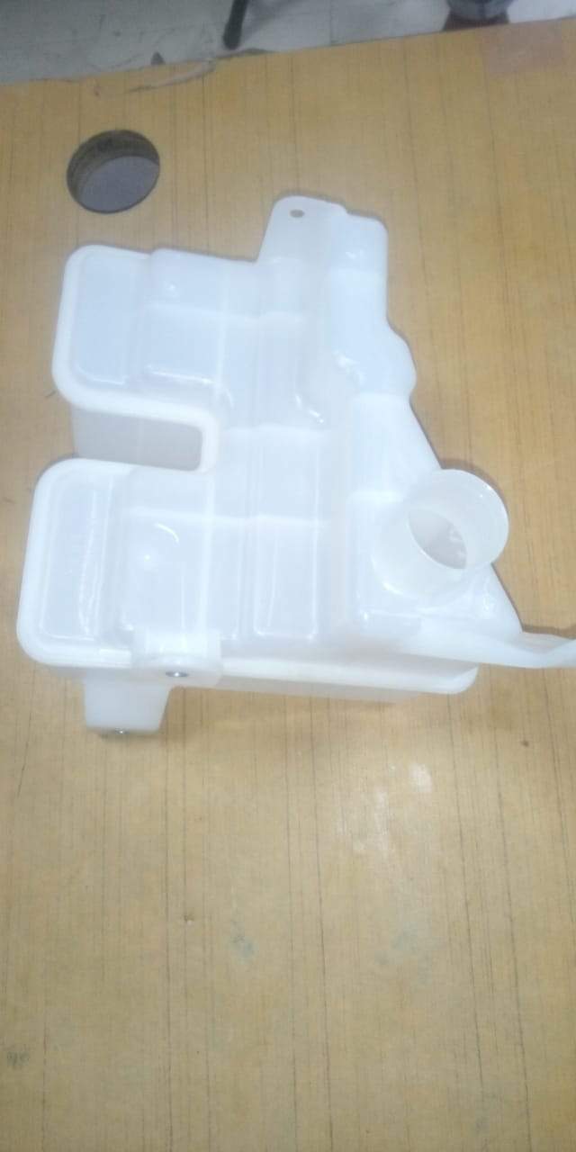 Maruti Suzuki Breeza wiper bottle reservoir for windshield washer system, durable plastic container.