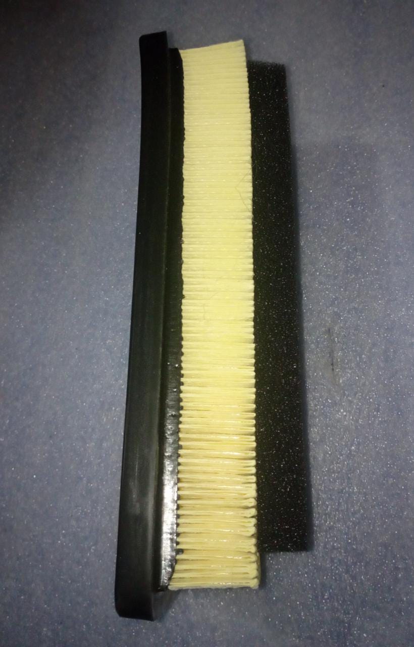 Minda diesel air filter for KUV 100, model AF4048PU, showing the cylindrical filter element and branding details.