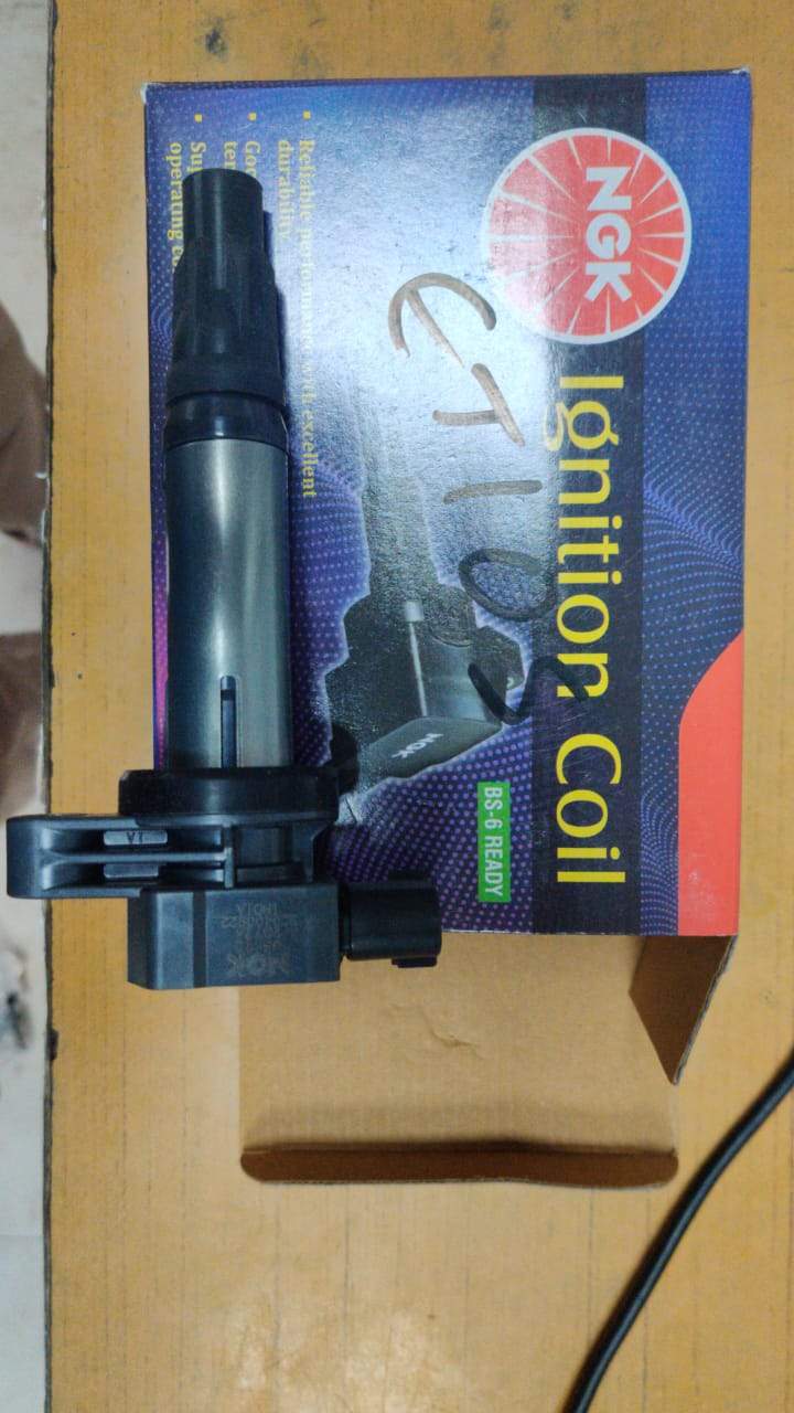 NGK ignition coil for Toyota Etios, close-up view showing the black coil with wiring connector and NGK branding.