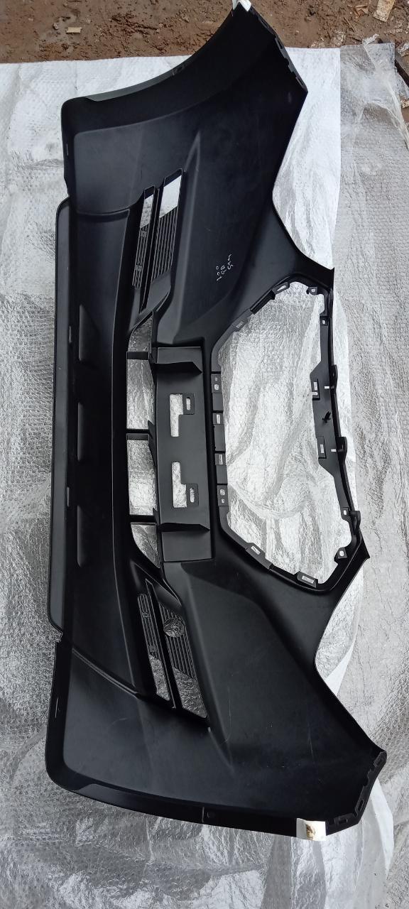 Nissan Datsun Ready Go front bumper in black, showing the exterior view with mounting points and grille details.