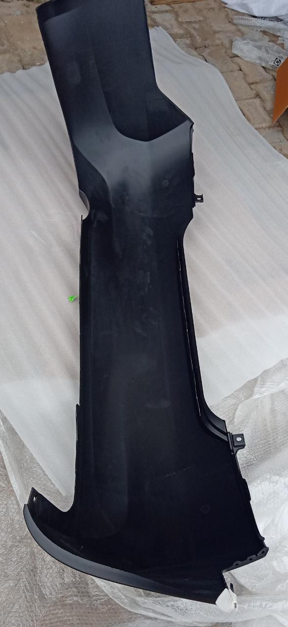 Nissan Sunny rear bumper 850223BB0H, automotive replacement part, shown in a close-up view on a white background